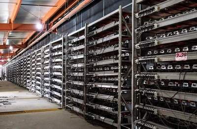 A photograph of a modern, well-ventilated mining farm using renewable energy sources in Australia.